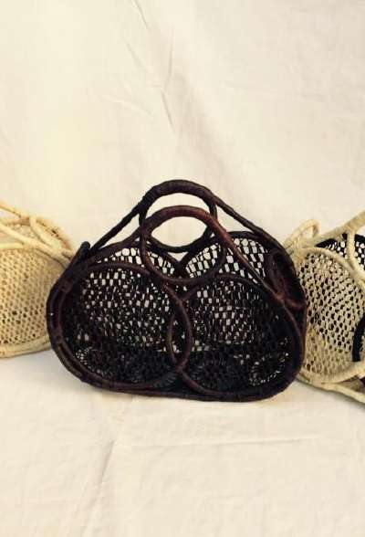 Black openwork macramé handbag, from the 2019 catalogue